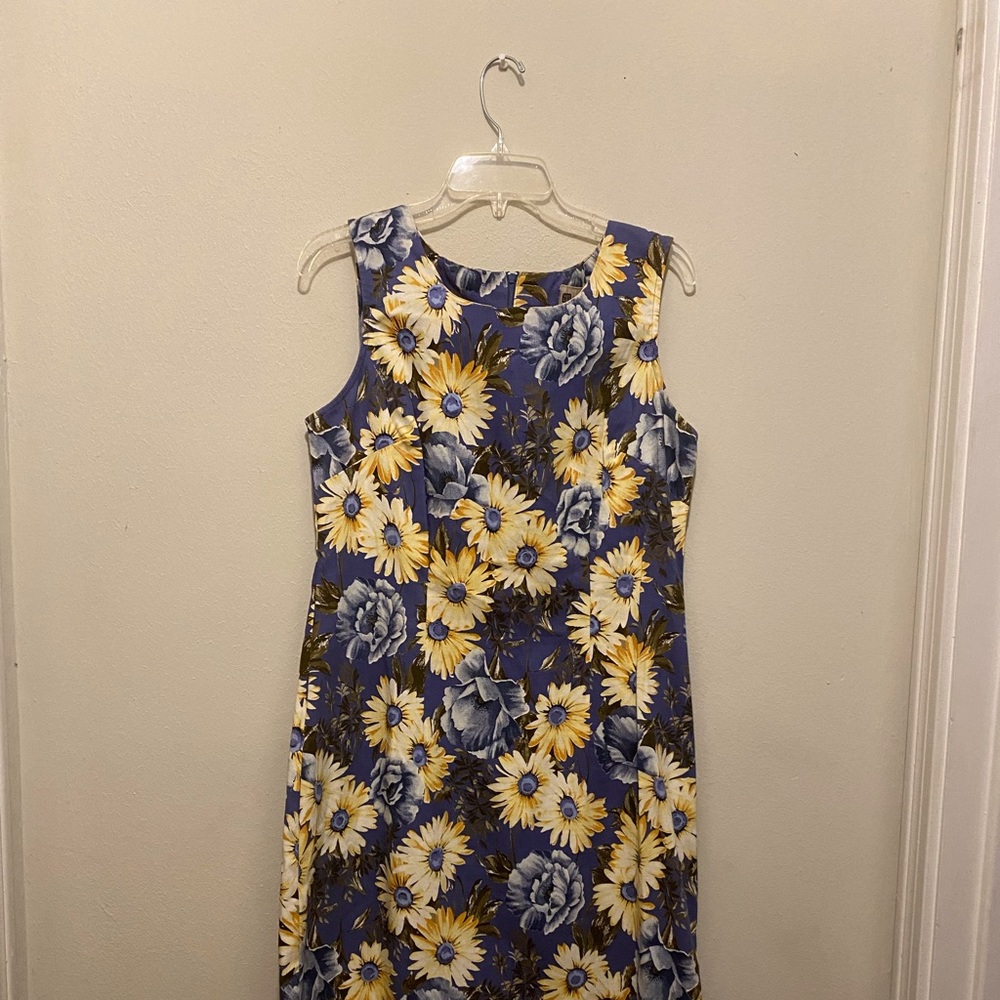 Blue sundress – comes right above the knee, zips up the back formfitting.